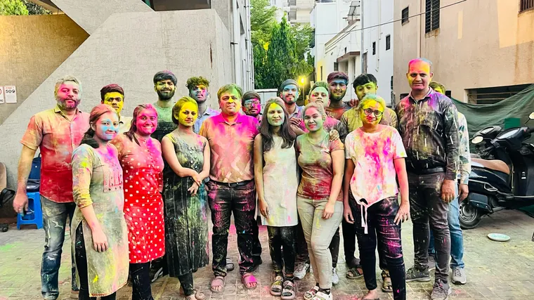 The TechnoBrains team covered in colours at the Holi celebration